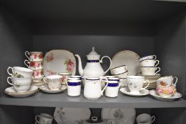 A selection of tea cups saucers and tea wares including Heathcote Sheraton