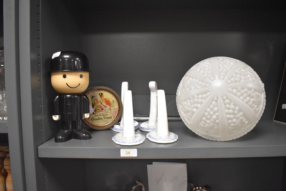 A selection of home wares including ceramic brackets and pressed milk glass art deco shade