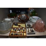 A mixe lot of glass bowls, fruit sets and flat ware.