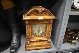 A 19th Century German carved mantel clock