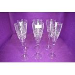 A set of six Edinburgh crystal champagne flutes in the Orrin design