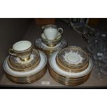 An assortment of china including Foley with extensive gilt detailing.