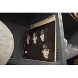 A vinyl record album in Mono the Beatles with the Beatles in fair condition