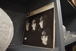 A vinyl record album in Mono the Beatles with the Beatles in fair condition