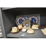 A selection of Cornish motto wares as a part tea set a Wedgwood Jasperware paper weight and two