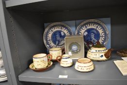 A selection of Cornish motto wares as a part tea set a Wedgwood Jasperware paper weight and two