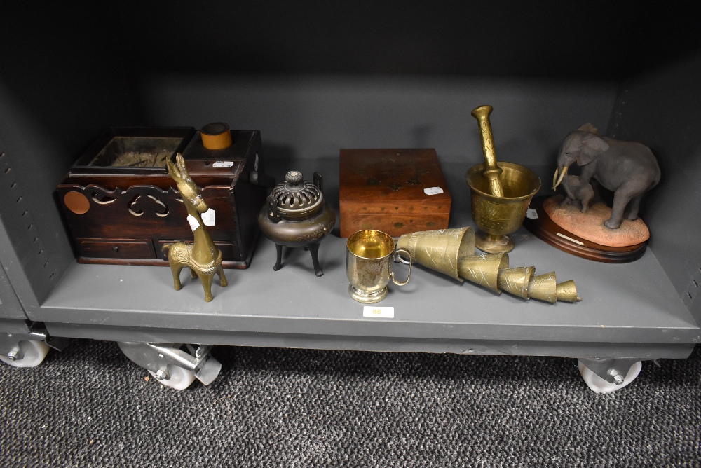 A selection of desk top and brass items including incense burner mortar and pestle and desktop tidy
