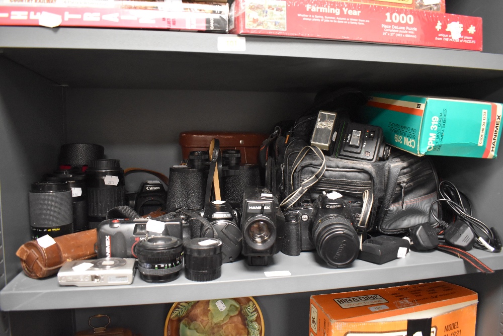 A selection of photography eq uipment and cameras with a good selection of lens including Cannon EOS
