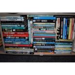 A large lot of books, or formula one and motor sport interest.