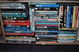 A large lot of books, or formula one and motor sport interest.