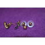 Two pairs of 9ct gold stud earrings and two odd gold earrings, approx 1g