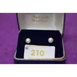 A pair of cultured pearl stud earrings on 9ct gold posts