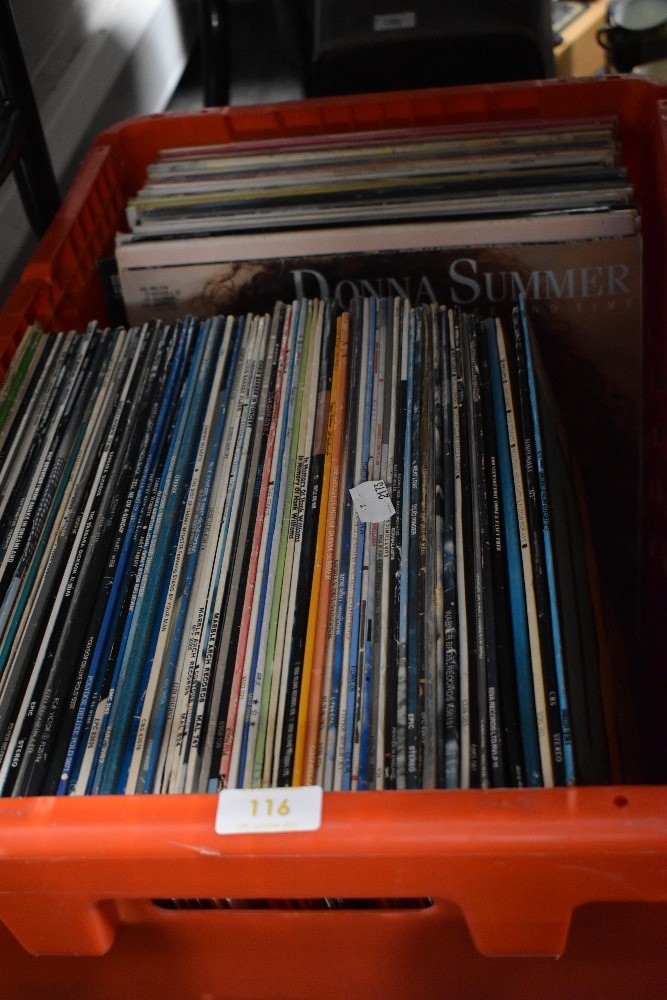 A selection of vinyl records and albums mostly 80's interest