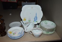 A selection of ceramics including floral Grafton cake plate and saucers.