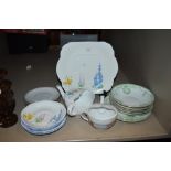 A selection of ceramics including floral Grafton cake plate and saucers.