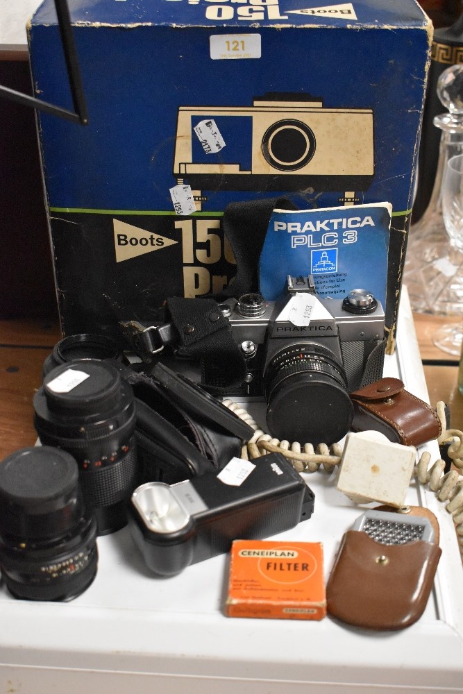 A Praktika 150 projector, Praktika camera, lenses and more.