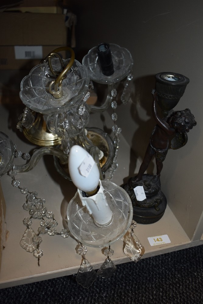 A vintage chandelier AF and bronzed effect cherub candlestick.