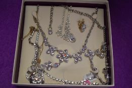 A selection of diamante and similar necklaces and earrings