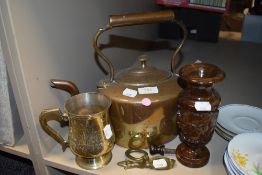 A vintage copper kettle, a tankard and carved wood vase.