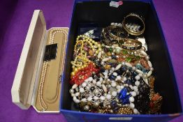 A selection of costume jewellery necklaces, bracelets and bangles, including cased set of Lotus