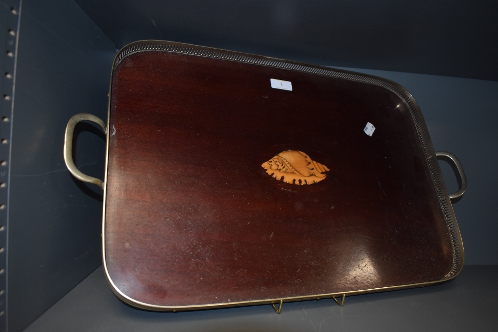 An early 20th century butlers tea tray having gallery sides with mahogany and inlayed platter