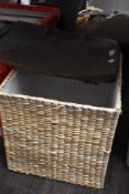 A wicker woven storage box