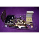 Seven modern costume wrist watches and a silver plated casket containing a small selection of clip