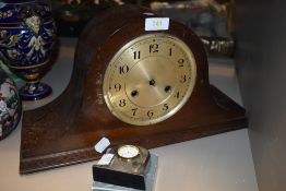 A hump back mantel clock having Greek key detailing to foot,AF.