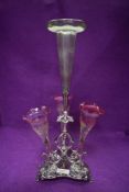 A silver plated epergne table centre having Vaseline fade to cranberry glass with Egyptian sphinx