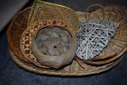 A selection of wicker woven and similar baskets