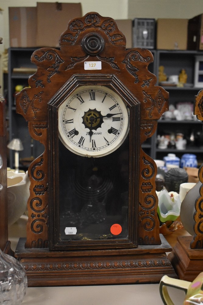 An early Ansonia Clock Co, America 8 day gingerbreaad clock