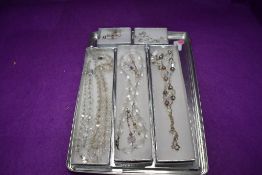 A small selection of crystal bead necklaces and earrings