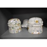 A selection of art deco lamp shades including a near pair of mottled and pressed form and a