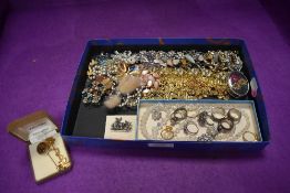 A selection of costume jewellery including crystal beads, brooches, rings etc