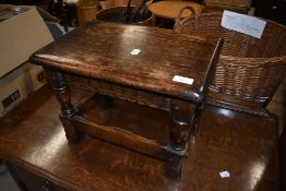 A traditional oak refectory style occasional table/stool