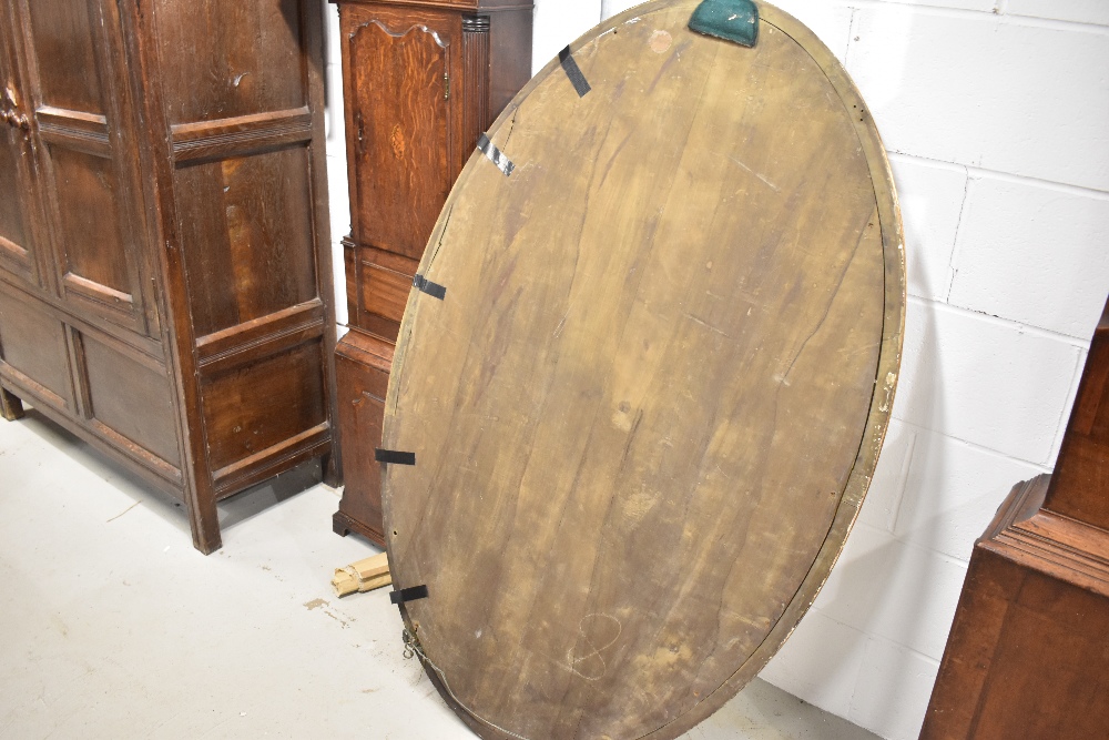 A late 19th or early 20th Century large giltwood/gesso wall mirror of oval form, having lozenge bead - Image 2 of 3