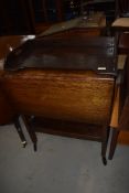 An early 20th Century oak and ply tea trolley and a similar bed tray (no legs)