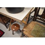 A folding card table having formica top