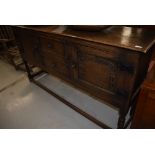 A traditional oak sideboard, nice quality reproduction sideboard, probably Titchmarsh and Goodwin,