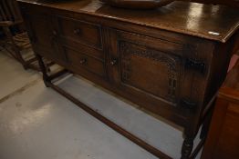 A traditional oak sideboard, nice quality reproduction sideboard, probably Titchmarsh and Goodwin,