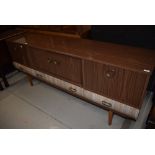 A vintage melamine/laminate long John style sideboard, width approx. 178cm