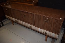 A vintage melamine/laminate long John style sideboard, width approx. 178cm