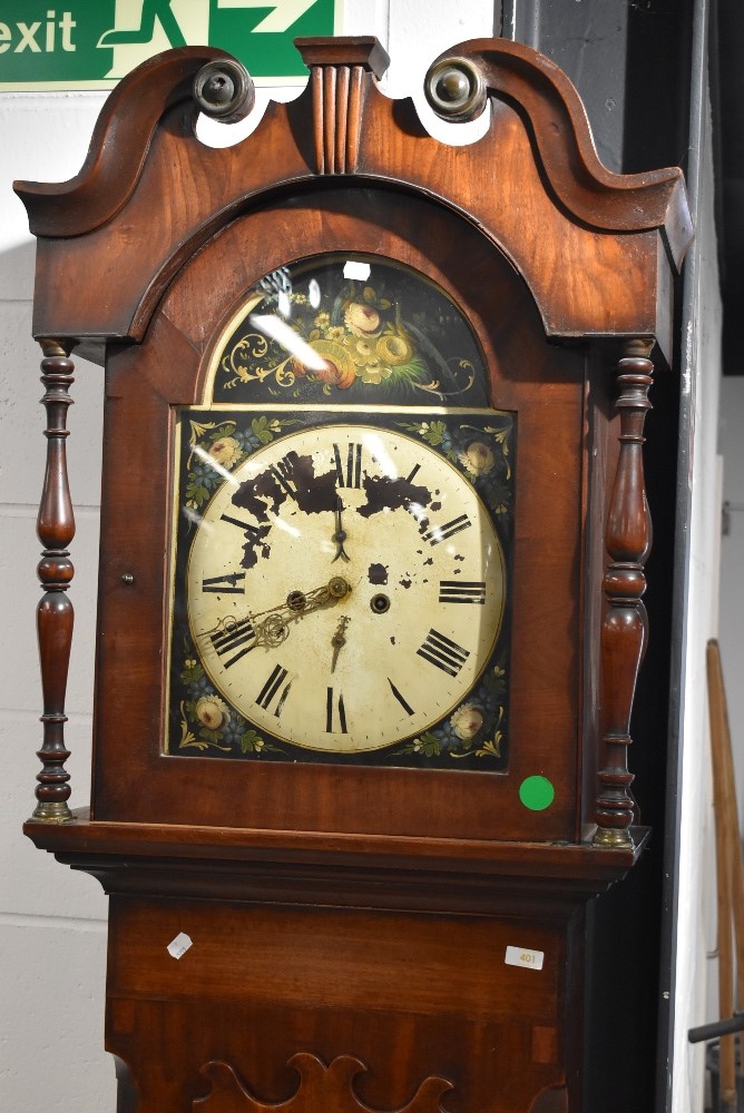 A 19th Century mahogany long case clock of large proportions having painted foliate dial, containing