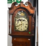A 19th Century mahogany long case clock of large proportions having painted foliate dial, containing