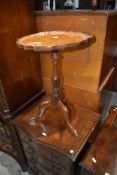 An early 20th Century mahogany wine table