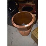 A large earthen ware pot/ egg crock having handles to sides