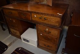A Victorian and later pedestal desk
