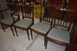 A set of four (three plus one) mahogany Regency style dining chairs