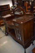 A Victorian mahogany credenza style sideboard having mirror back , width approx. 135cm