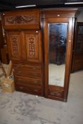 A Victorian mahogany part wardrobe , being centre linen press section and mirror door robe,